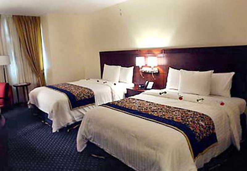 โฮเดลป้า การ์เด้น คอร์ท โฮเต็ล Hotel ซานติอาโก เด ลอสกาบาเญโรส ห้อง รูปภาพ