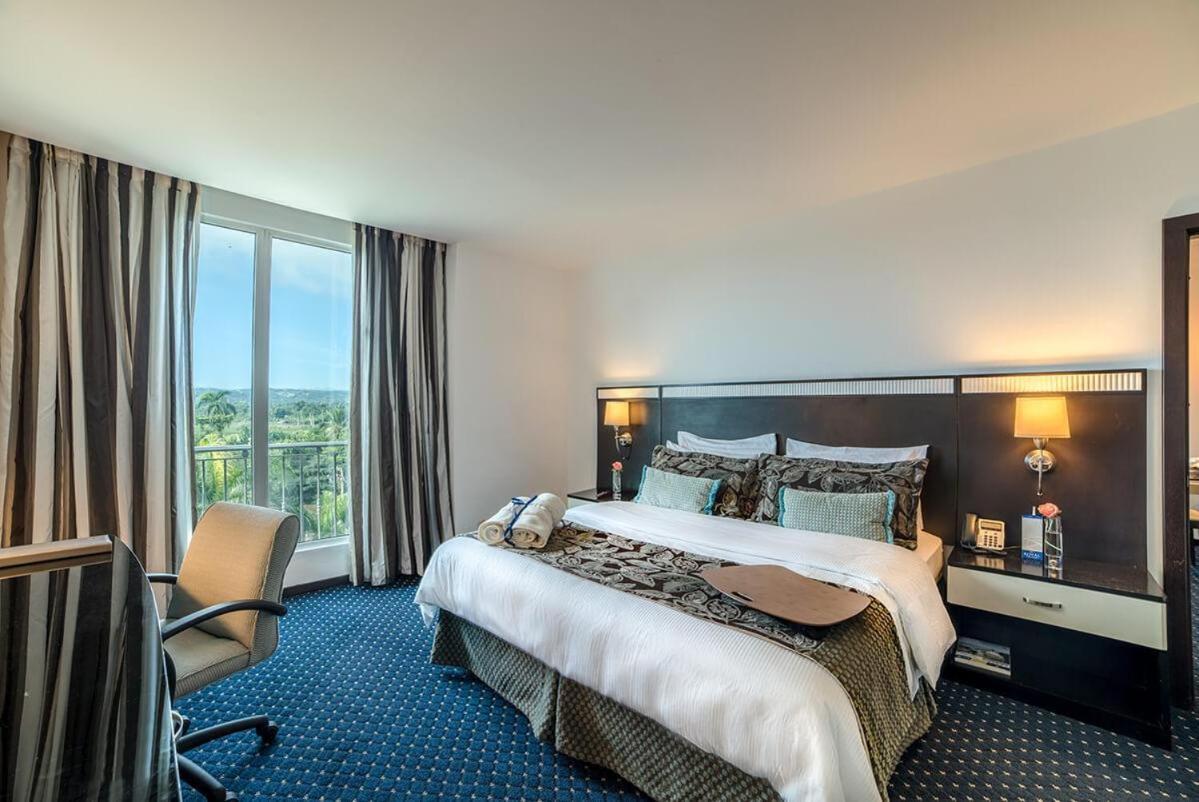 โฮเดลป้า การ์เด้น คอร์ท โฮเต็ล Hotel ซานติอาโก เด ลอสกาบาเญโรส ภายนอก รูปภาพ